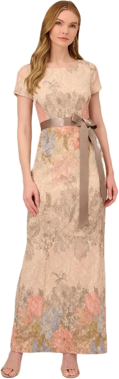 Elegant matelasse column gown in [color] with floral design, cap sleeves, and back slit, styled for wedding guest occasions — view 1