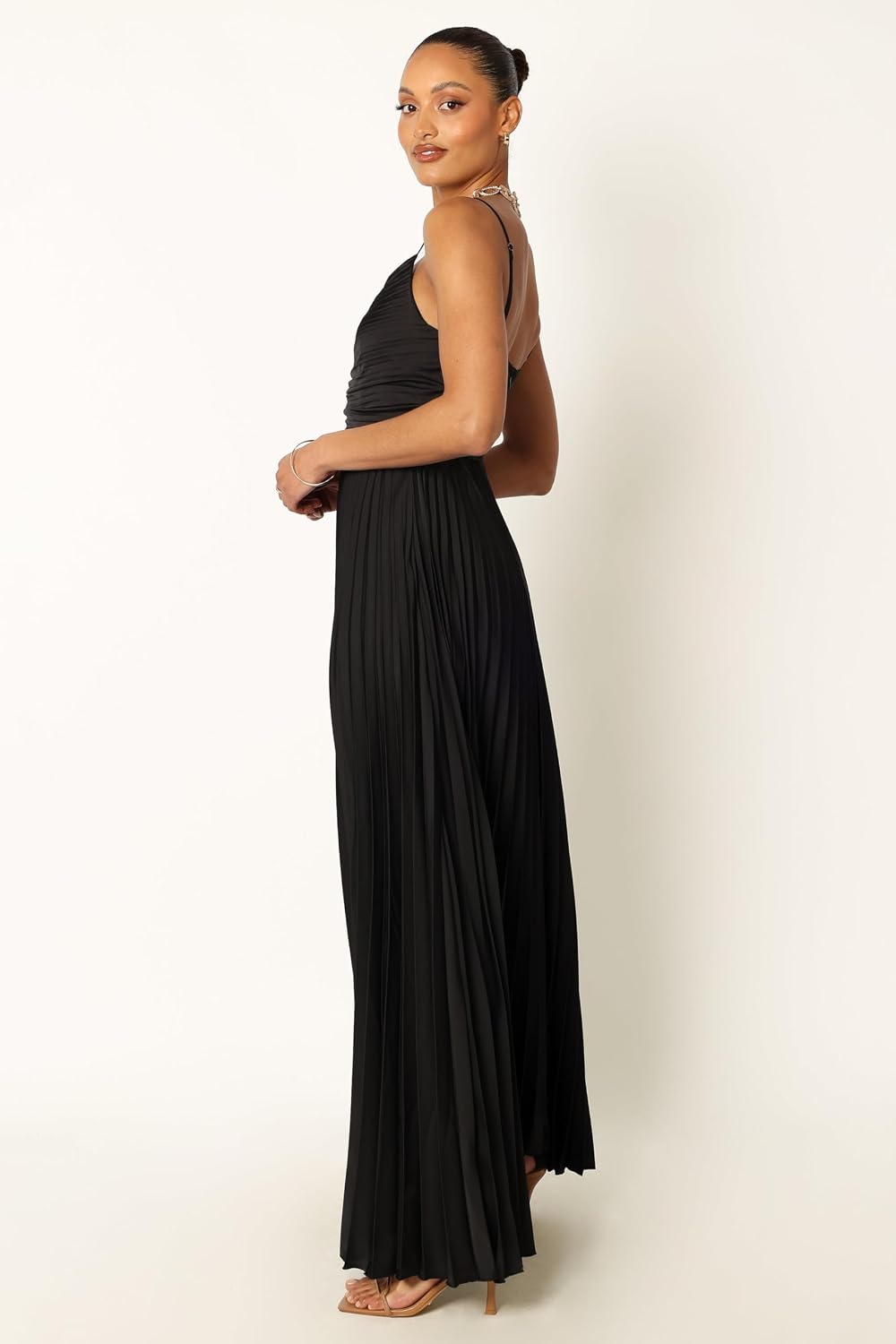 Pleated maxi dress in [color] worn as wedding guest outfit — view 3