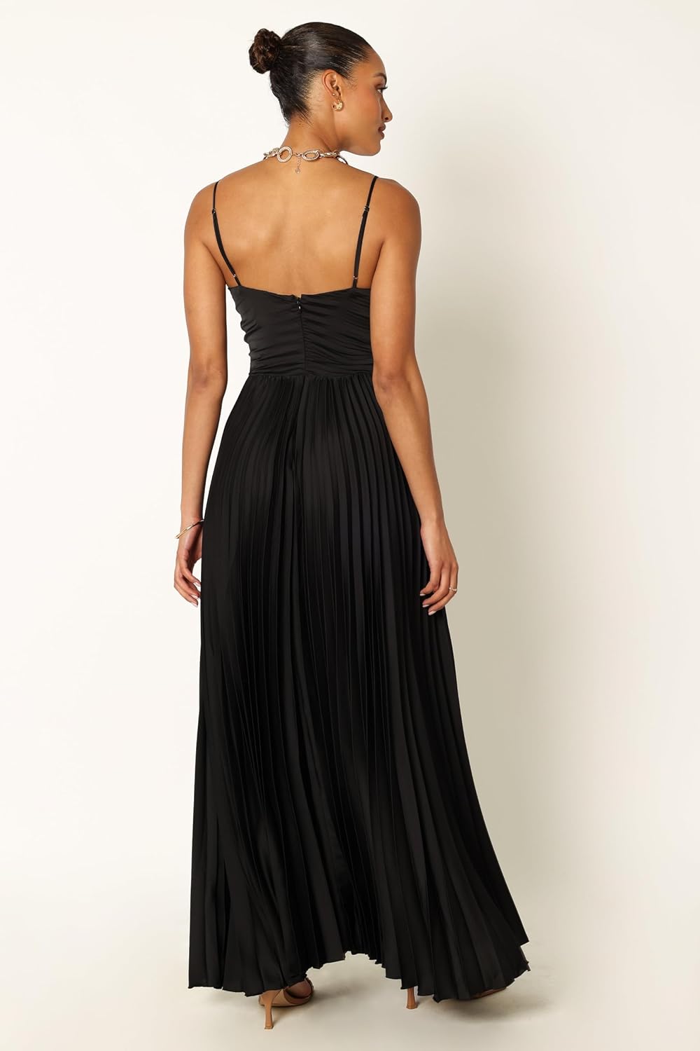 Pleated maxi dress in [color] worn as wedding guest outfit — view 4